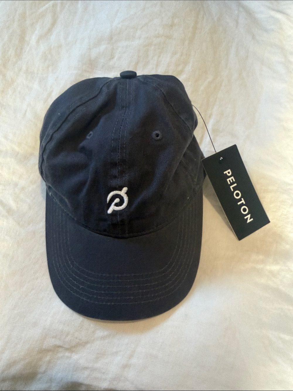 Peloton Black Baseball Cap with White Embroidered Logo